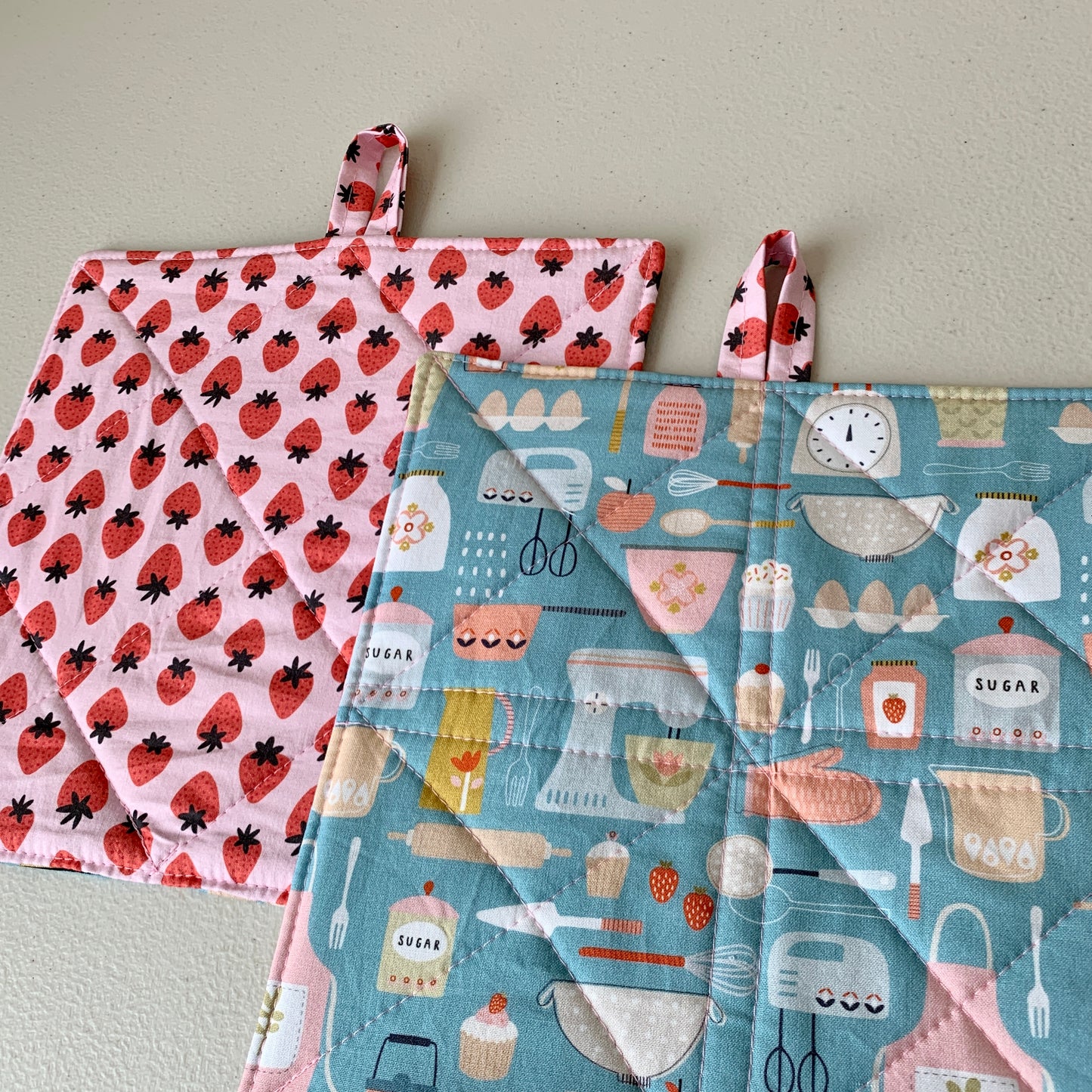 Quilted Pot Holder Set with strawberries and baking supplies