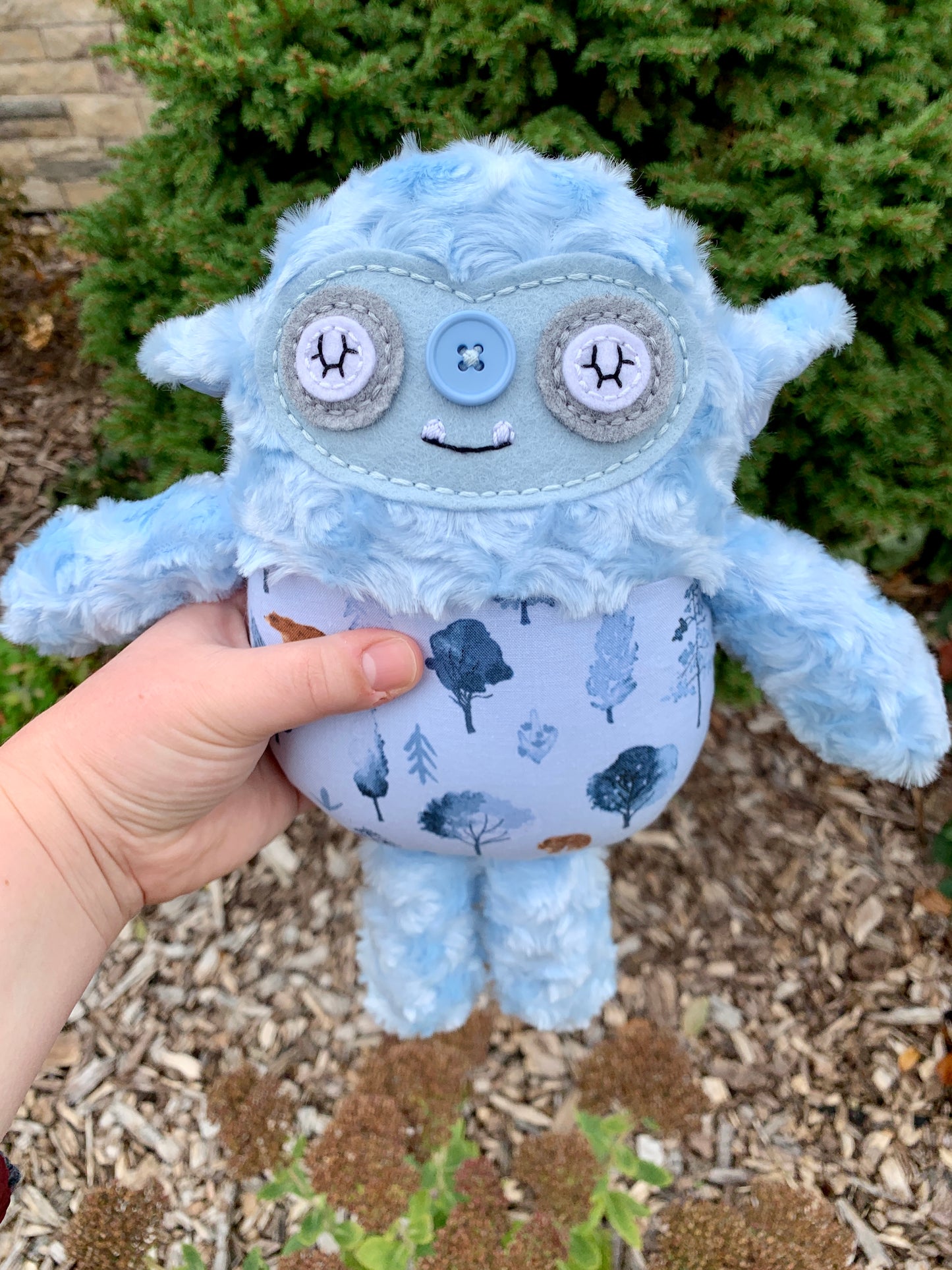 Tiny Baby Blue Goblin with trees and bears