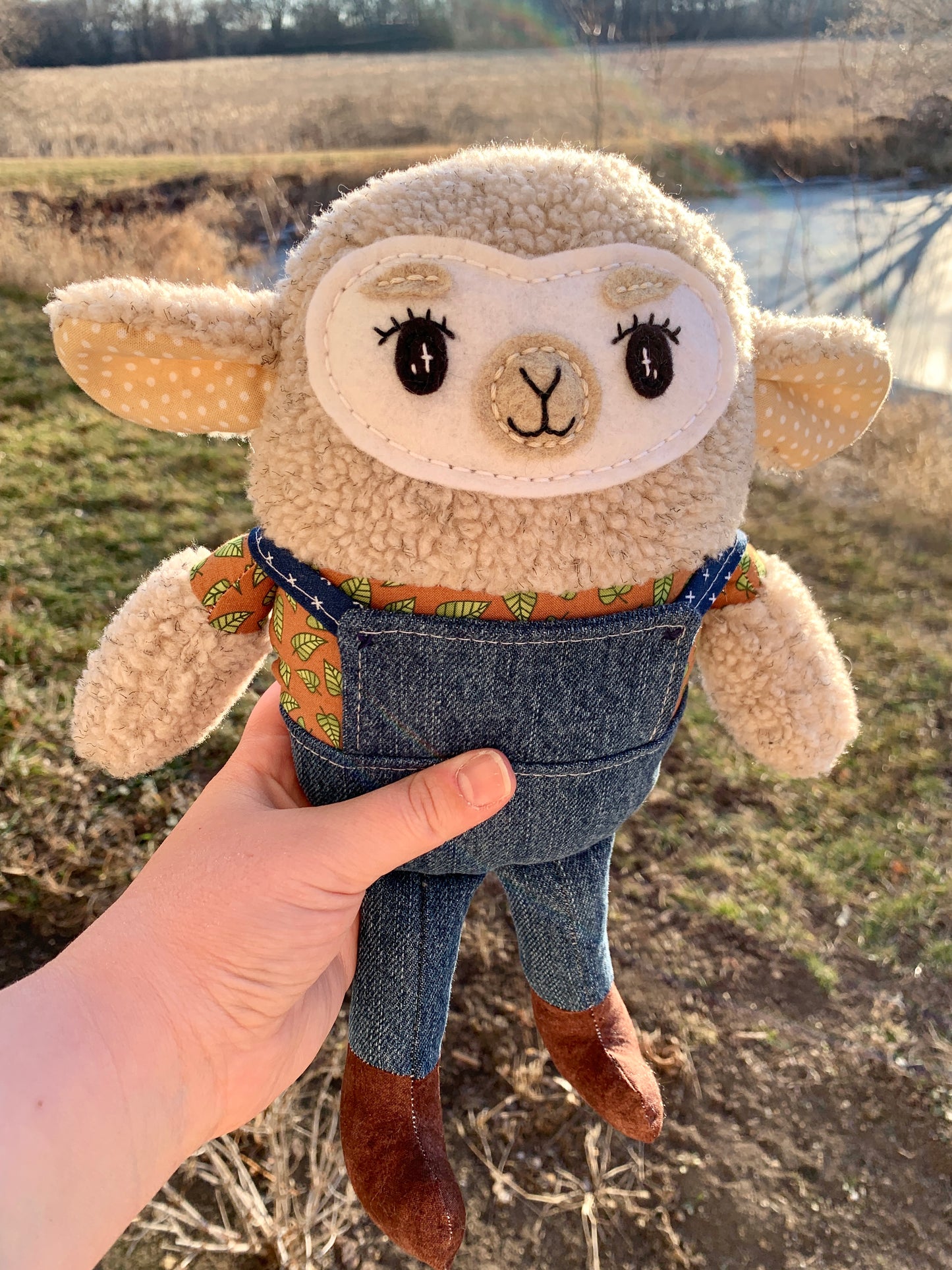 Stevie the Sheep with leaves and jean overalls